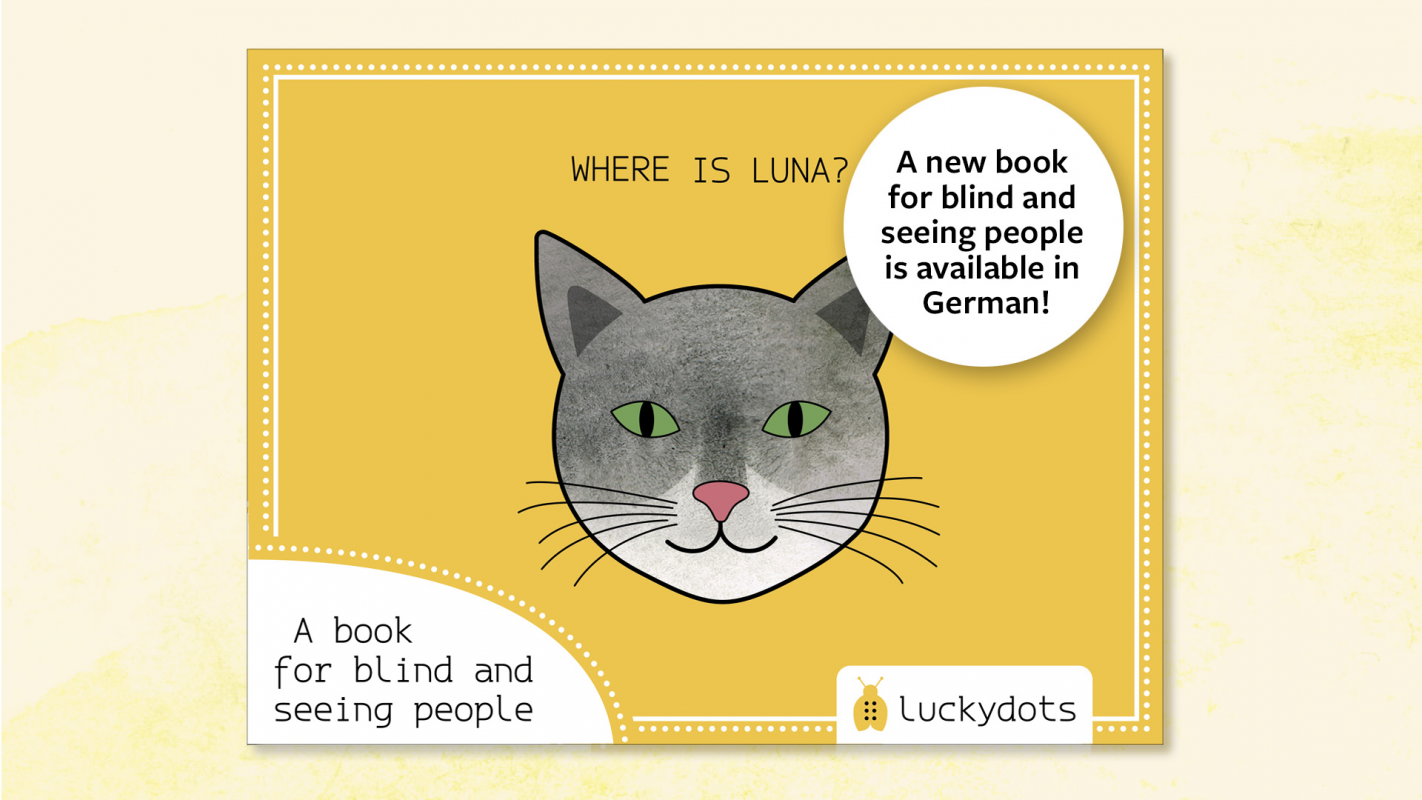 Friendly cat on yellow book cover (C) Anna Weinzettl